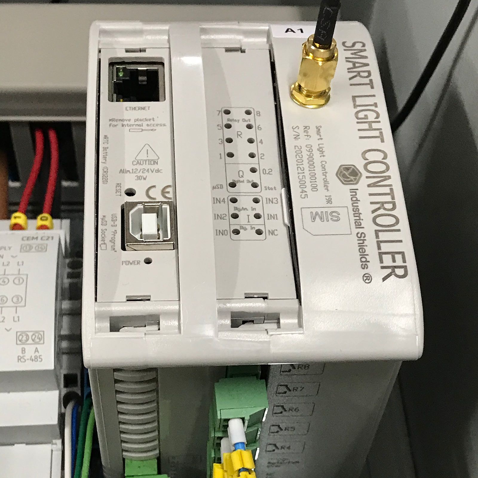 Smart Light Controller SLC19R by Industrial Shields with a GPRS antenna mounted on a DIN rail