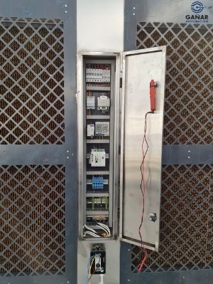 Open control cabinet of the HVAC unit with DIN rail devices