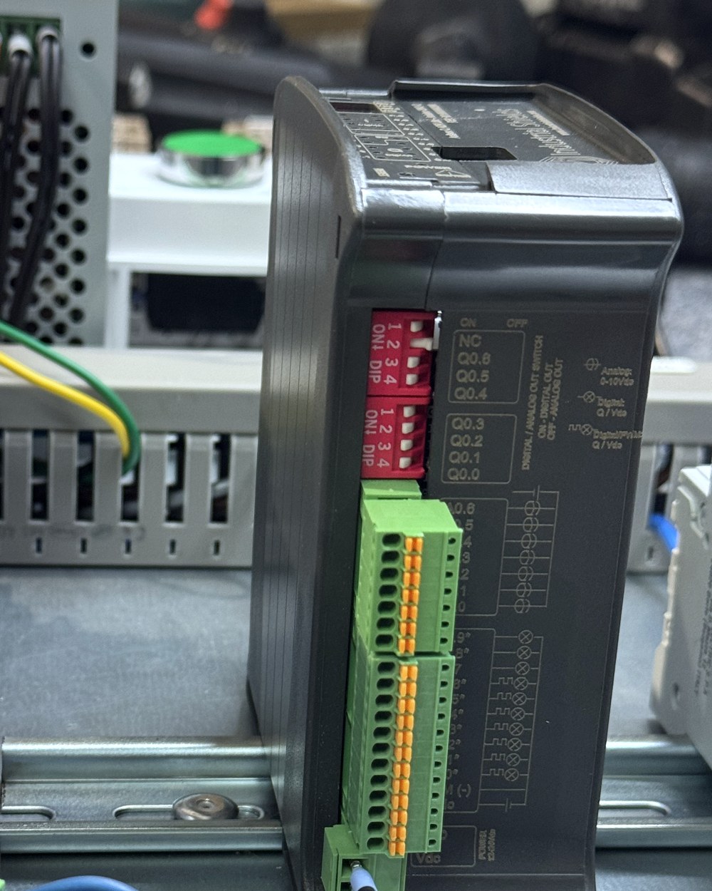 Ardbox Q Analog next to other devices in a control cabinet