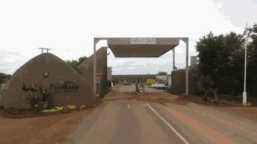 Ndlovu Gate at Dinokeng Game Reserve, with the entrance canopy and the access lane