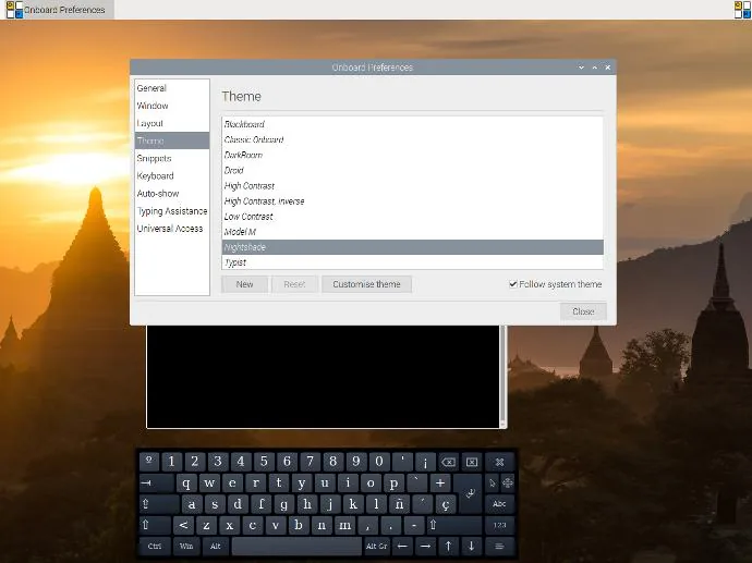 Onboard Preferences window on the Theme tab, with the Nightshade theme selected and the keyboard below